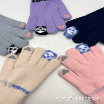 Company of knitted gloves for child